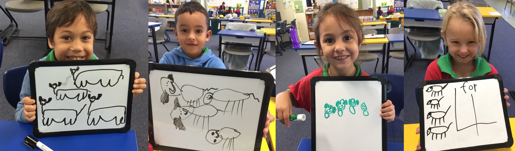 students showing off their drawings on mini whiteboard